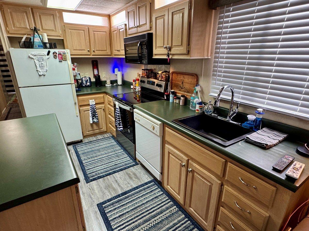 Buy a 99 AquaChalet 16 x 68WB NLSH - AQUA CHALET at Shestakov Yacht Sales