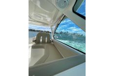 Лучшая цена на 2016 Pursuit DC 325 Dual Console 32