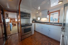 Buy a INNISFAIL Trumpy Fantail Houseboat at Shestakov Yacht Sales